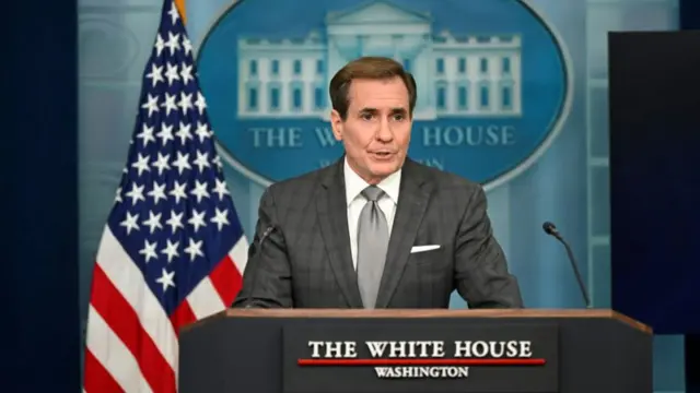 John Kirby speaks from the lectern in the White House press briefing room