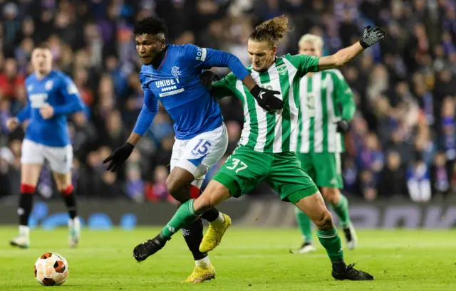 Rangers' Jose Cifuentes gets past Aris Limassol's Julius Szoke