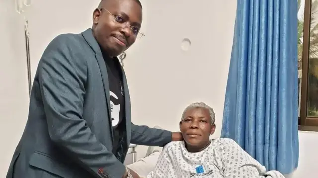 Safina Namukwaya, 70, during the delivery of twins at the Women's Hospital International and Fertility Centre in Kampala, Uganda, on 29 November, 2023