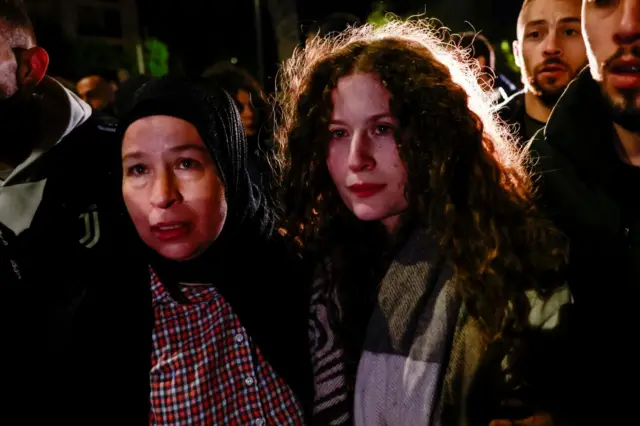 Palestinian activist Ahed Tamimi, with her mother, after being released