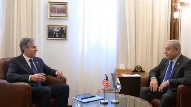 A handout photo made available by Israel's Government Press Office (GPO) shows Israeli Prime Minister Benjamin Netanyahu (R) during his meeting with US Secretary of State Antony Blinken (L) in Jerusalem,l 30 November 2023.