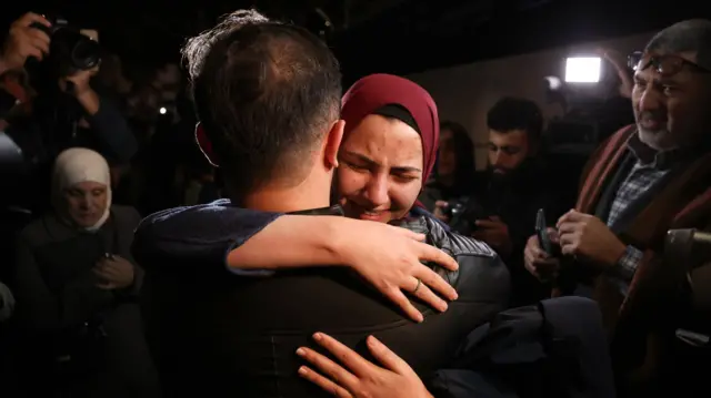 Palestinian prisoner is greeted by loved one after being released from the Ofer Israeli military prison