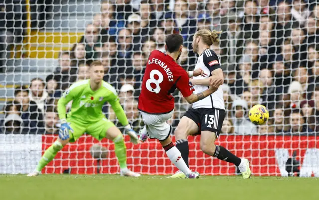 Bruno Fernandes side-foots the ball towards goal