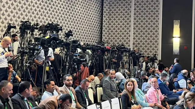 Media waiting for press conference in Amman