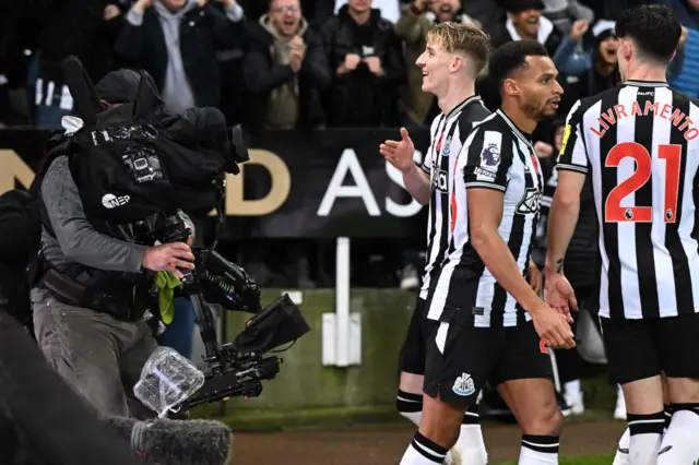 Anthony Gordon celebrates in front of the cameras