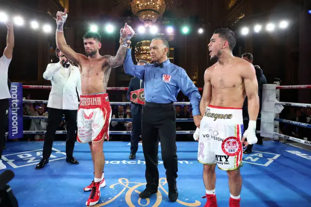 Joe Cordina has his hand raised