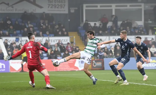 Ross County goalkeeper Ross Laidlaw makes a save to deny Paulo Bernardo