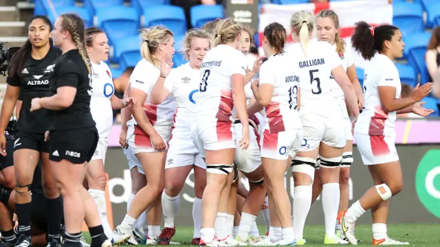 England celebrate a try against New Zealand