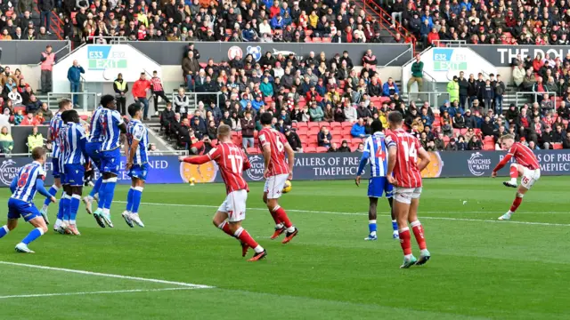 Tommy Conway (far right) shoots from distance for Bristol City