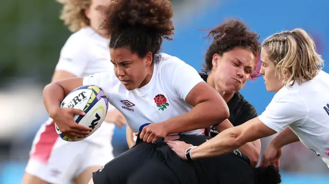 England carry the ball against New Zealand