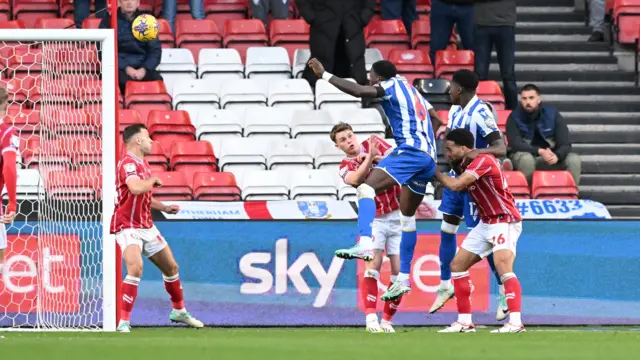 Dominic Iorfa heads towards goal for Sheffield Wednesday