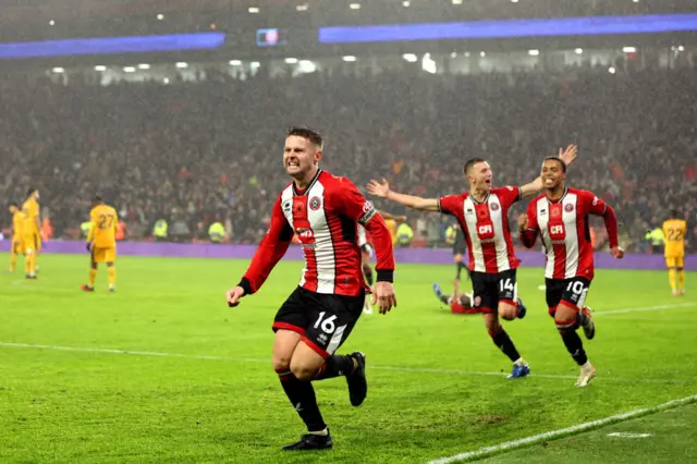 Ollie Norwood celebrates