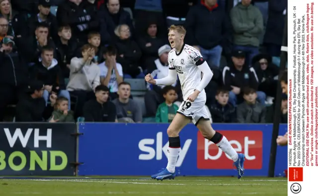 Josh Coburn runs and celebrates his goal