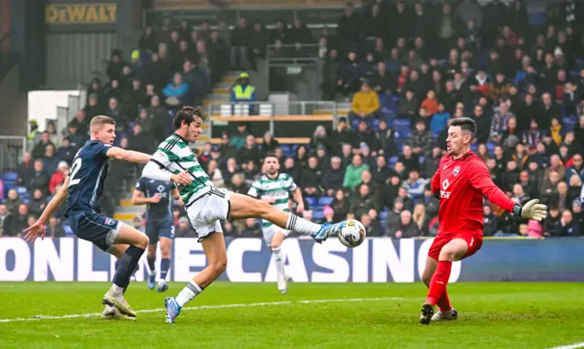 Celtic's Paulo Bernardo has a shot saved by Ross County goalkeeper Ross Laidlaw