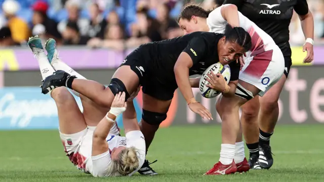 New Zealand carry the ball against England