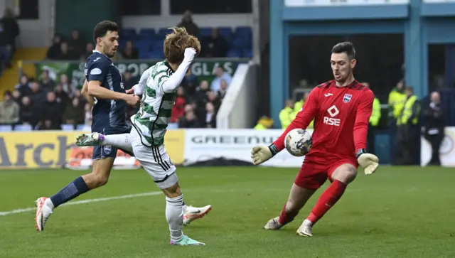 Ross County goalkeeper Ross Laidlaw makes a save to deny Kyogo Furuhashi