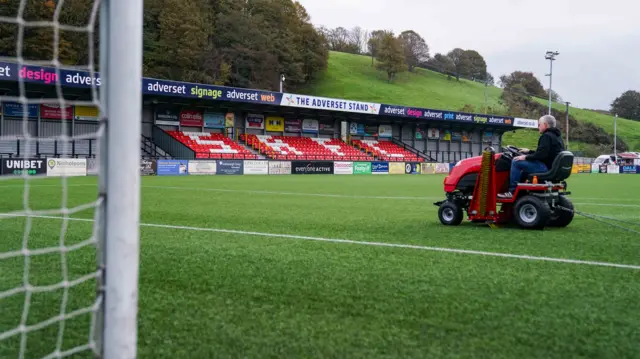 Groundsman on tractor at Scarborough Athletic