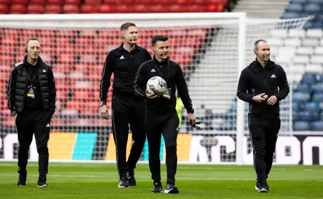 Referee Nick Walsh on the Hampden pitch