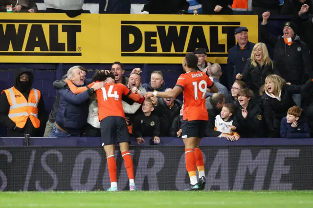 Tahith Chong of Luton Town celebrates