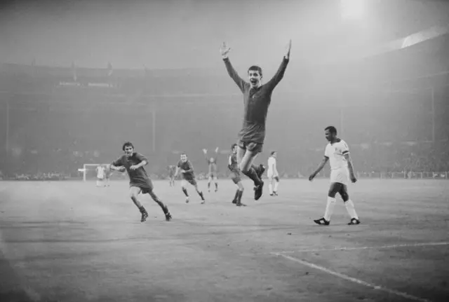 Manchester United's Brian Kidd celebrates after scoring the 3rd goal with a header, on his 19th birthday, at the European Cup Final at Wembley against SL Benfica