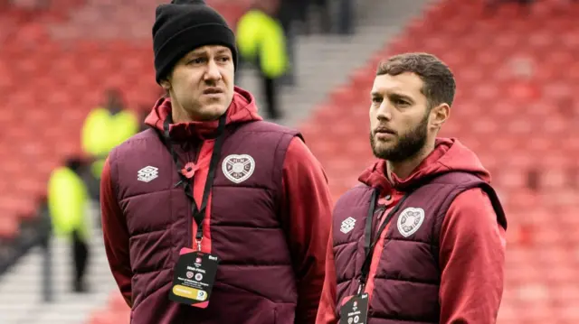 Hearts' Peter Haring and Jorge Grant