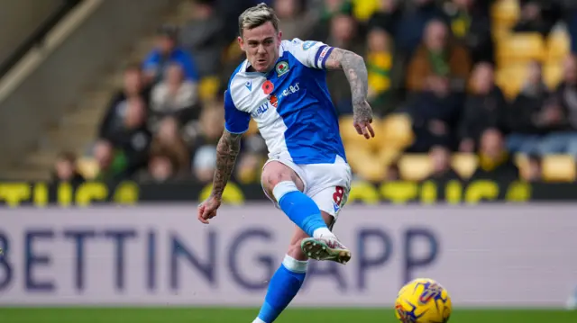 Sam Szmodics strikes the ball to score