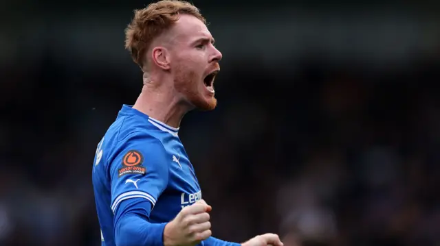 Tom Naylor celebrates scoring for Chesterfield