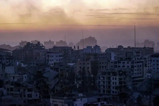 Smoke rises above the northern Gaza Strip after Israeli air strikes - Israel said earlier "we attack with great force"