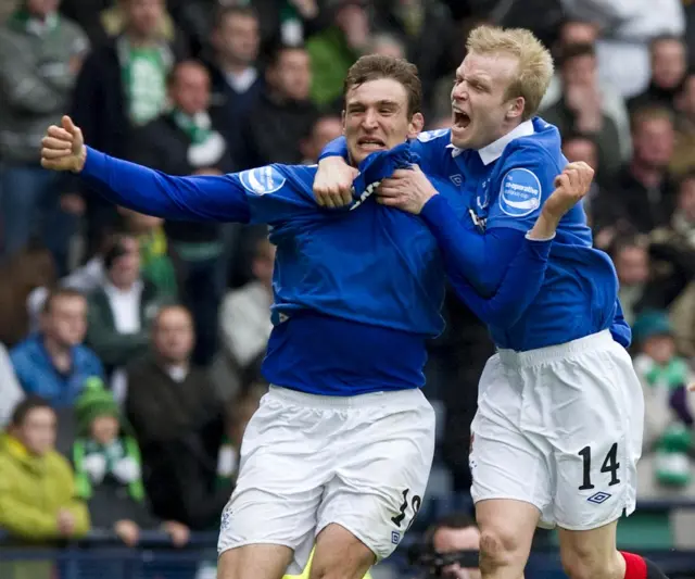 Nikica Jelavic (left) celebrates