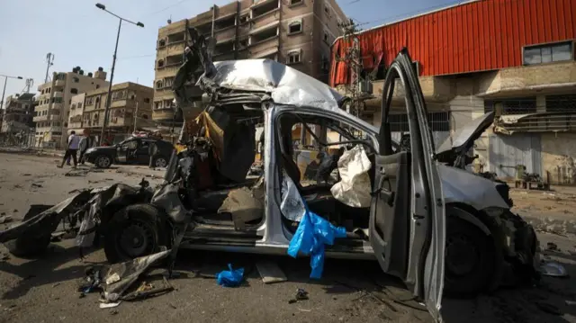 A destroyed vehicle in the northern Gaza Strip as Israel continues its ground offensive with a mission to eliminate Hamas after it launched a series of deadly attacks on 7 October