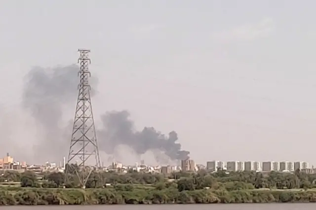 A picture taken from Omdurman shows smoke billowing north of Khartoum on July 22, 2023.