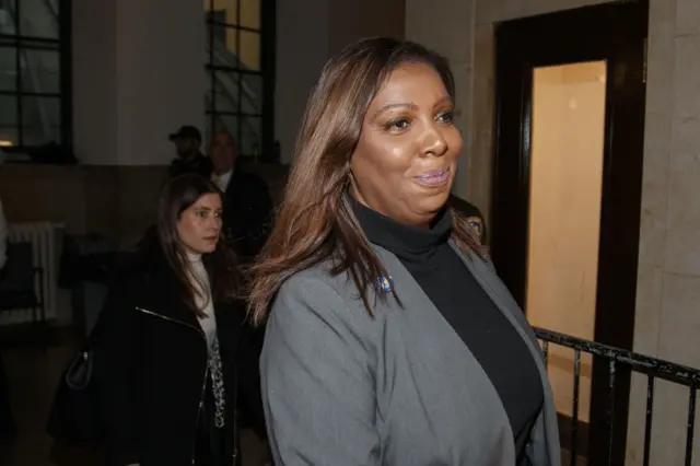 Attorney General Letitia James arrives at Donald Trump's fraud trial last week, walking past the camera