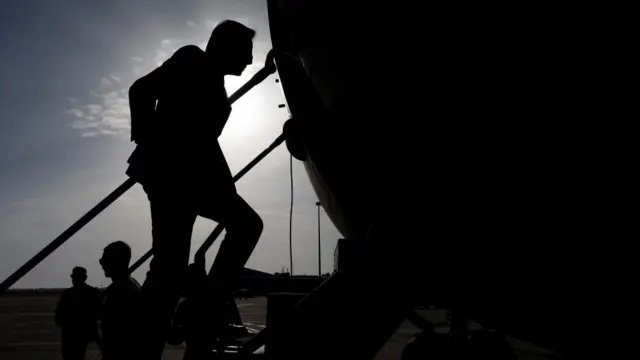 U.S. Secretary of State Antony Blinken boards a military transport aircraft en route to Iraq