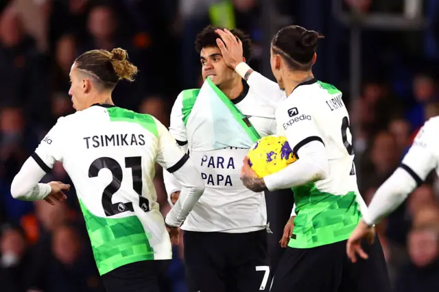 Luis Diaz lifts his shirt to reveal a message to his father's kidnappers after scoring for Liverpool against Luton