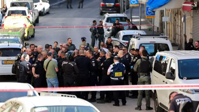 Israeli officials work at the scene of an incident in Jerusalem November 6, 2023.