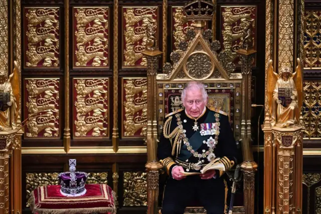 King Charles, as Prince of Wales, delivering the Queen's speech on behalf of his mother last year