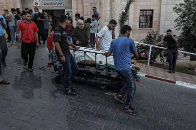 A wounded Palestinian being brought to the Indonesian Hospital after an Israeli airstrike in Gaza