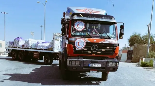 Truck carrying aid into Gaza