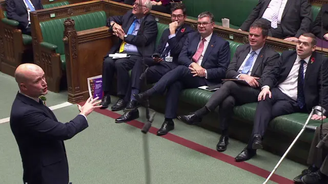 MP Stephen Flynn addresses four MPs in front of him in Commons