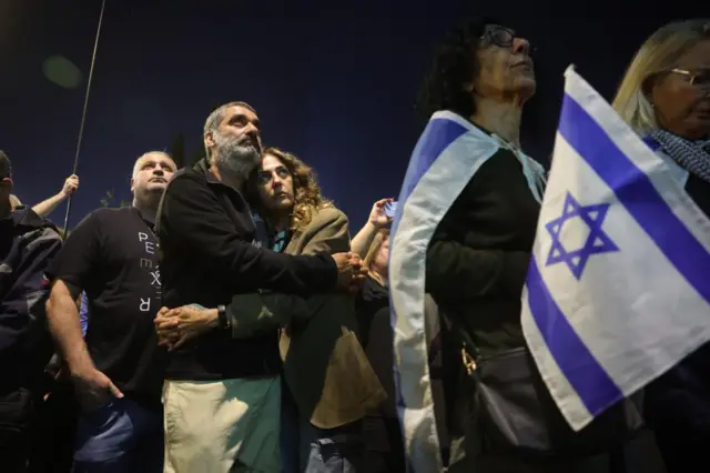 People commemorate one month since the 7 October Hamas attack on Israel during a memorial rally outside the Israeli Knesset (parliament) in Jerusalem, 7 November 2023