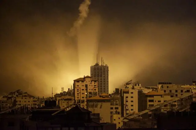 Flares from Israeli airstrikes light the sky in northern Gaza