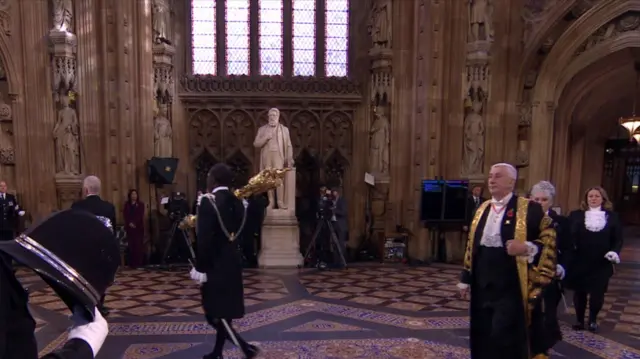 Hoyle leading a procession