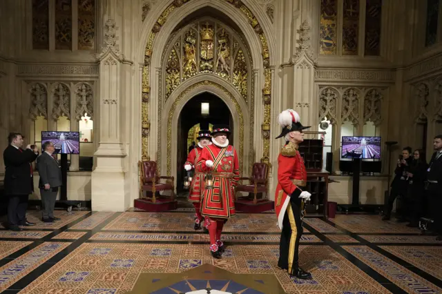 The Yeoman of the Guard Ceremonial Search pass through the Peer's Lobby at the Palace of Westminster