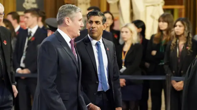 Prime Minister Rishi Sunak (left) walks with Labour Party leader Sir Keir Starmer through the Central Lobby at the Palace of Westminster