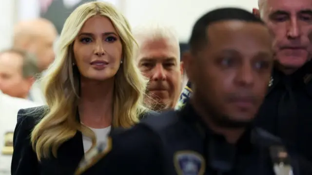 Ivanka Trump walks down the hallway as she attends the Trump Organization civil fraud trial