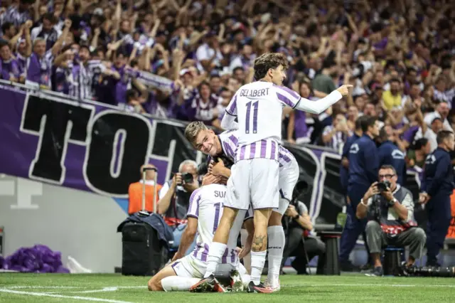 Toulouse celebrate their win against LASK.