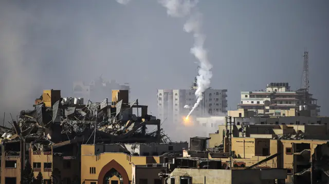 Smoke rises during combat between the Israeli army and Hamas fighters, in the western Tel al-Hawa neighborhood in the northern Gaza Strip