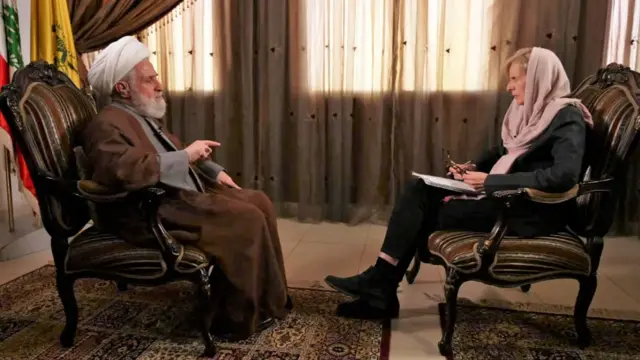 Sheikh Naim Qassem talks to the BBC's Orla Guerin in Beirut