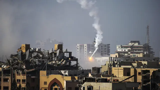 Smoke rises in the Tel al-Hawa neighbourhood of Gaza following more fighting between Hamas and the Israeli military