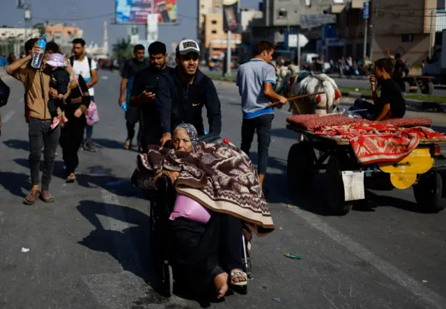 People heading south in Gaza on Thursday